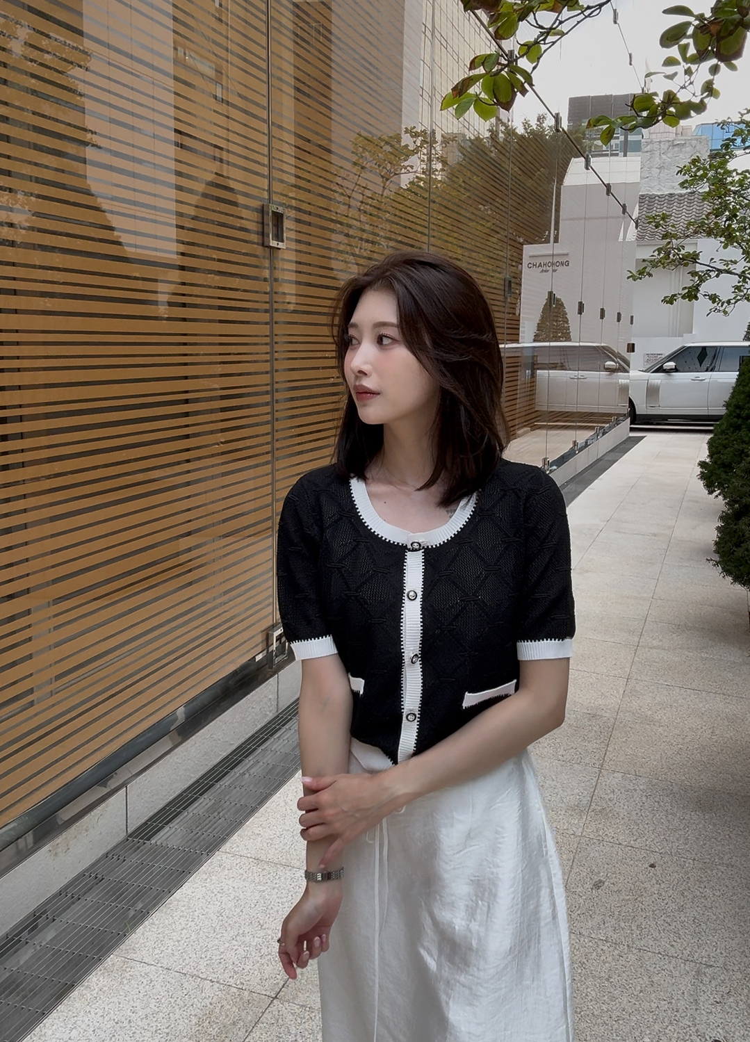[시즌오프]컬러 배색 아일렛 니트 가디건_BLACK_9
